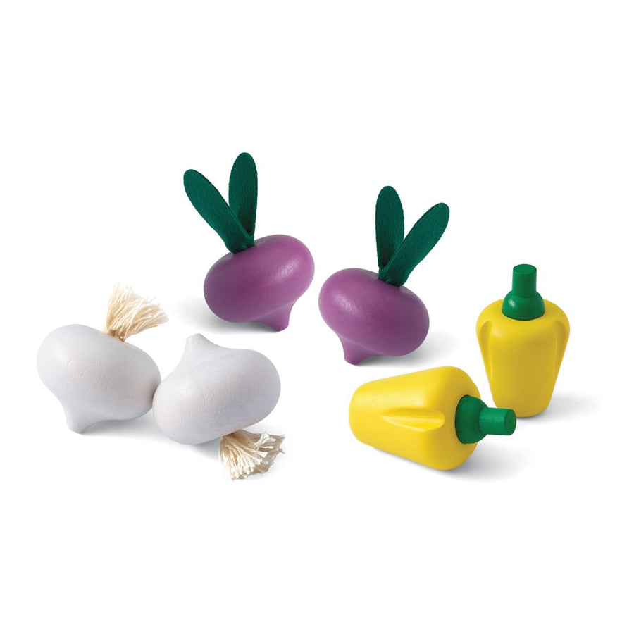 Ensemble de produits frais C (radis rouges, ails et poivrons jaunes)