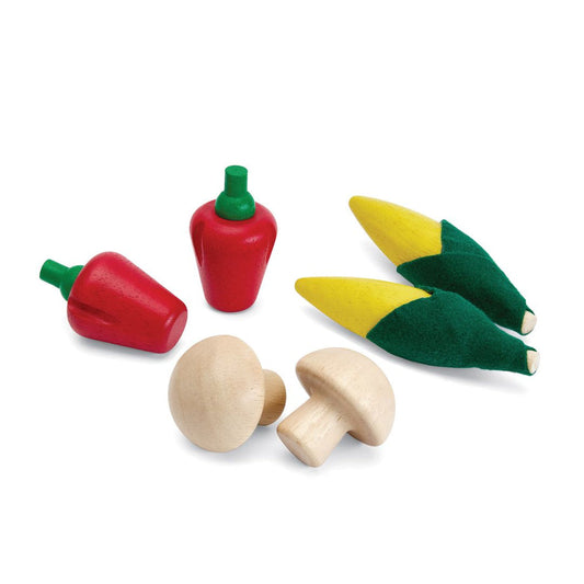 Assortiment de produits frais D (épis de maïs, champignons et poivrons rouges)