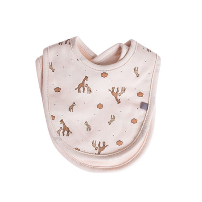 Two soft 100% cotton baby bibs in a neutral blush tone with an all-over giraffe print, displayed layered together.