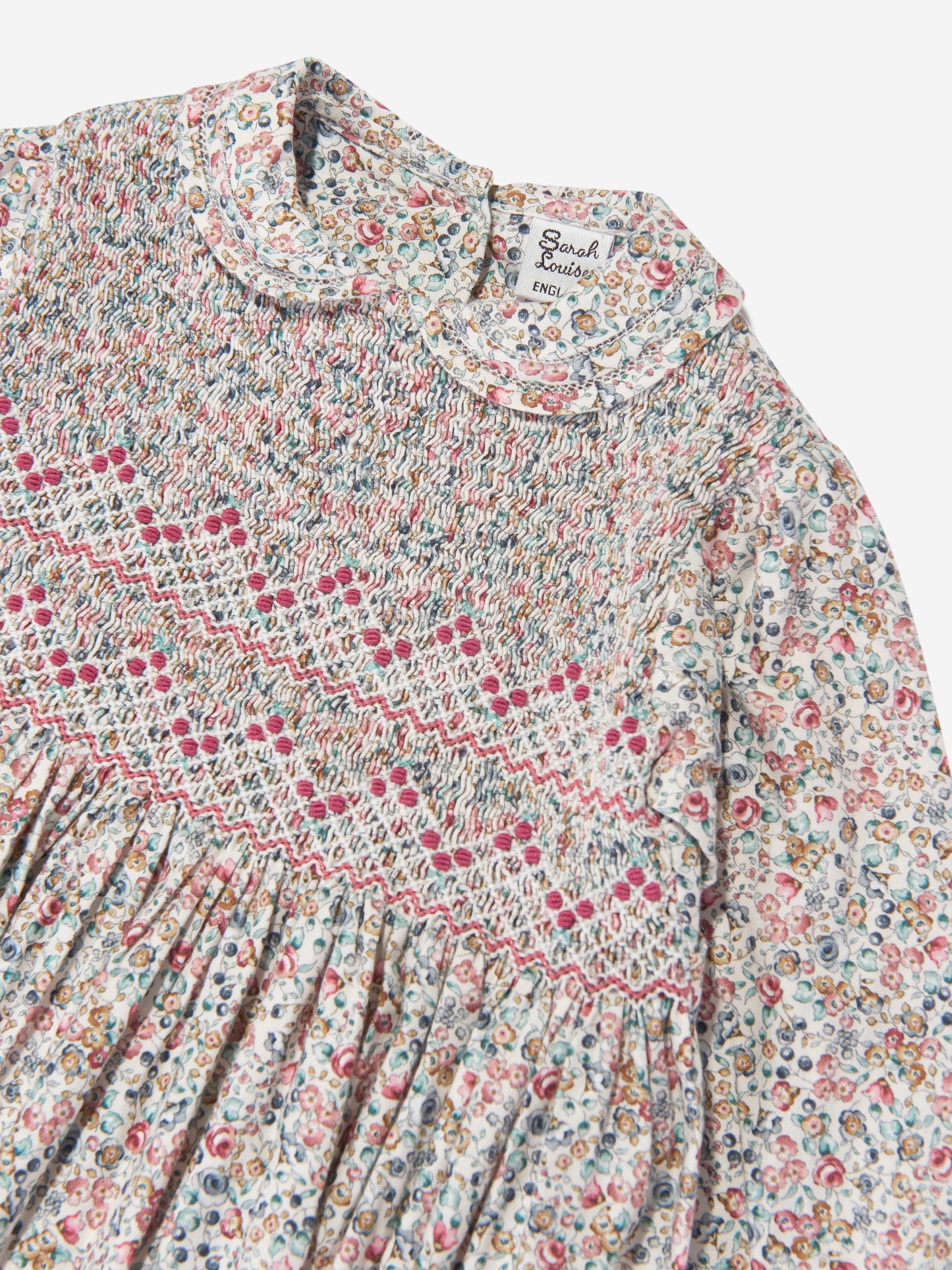Sarah Louise Girls Floral Smocked Dress in Blue