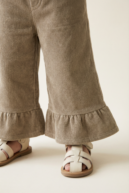 Pantalon en velours côtelé de coton taupe à ourlet volanté