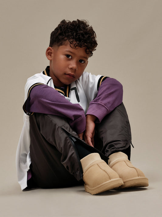 UGG Kids Classic Ultra Stretch Cuff Boots in Sand
