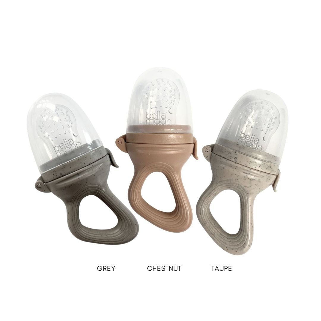 Set of three BellaMoon Fruit Feeders in Chestnut, Taupe, and Grey, featuring ergonomic handles, protective lids, and soft silicone teats for baby weaning and teething comfort.