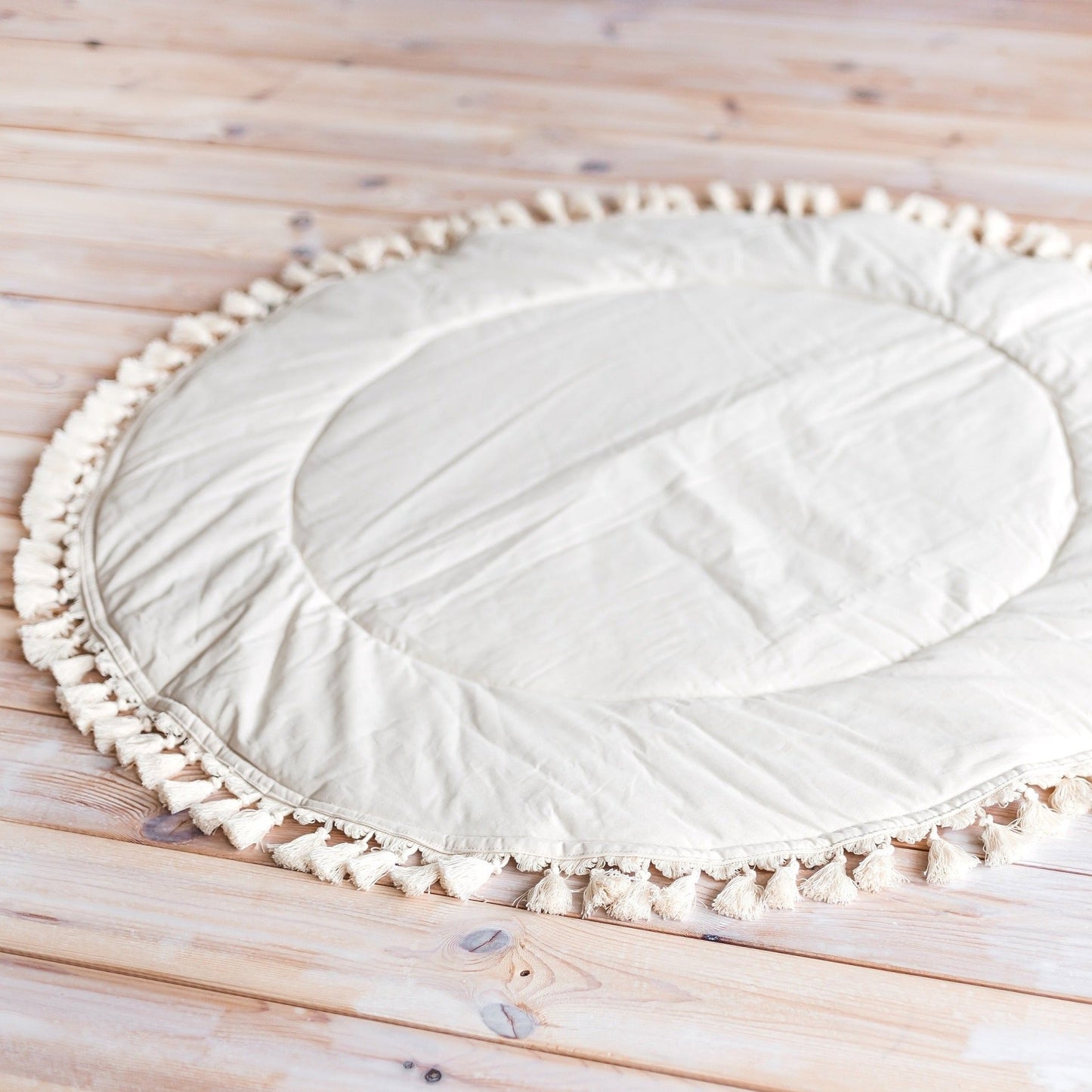 MINICAMP | Padded Kids Play Mat in Ecru with Tassels - The Little Hive